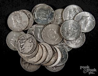 Eleven silver half dollars