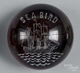 White frit paperweight, with a sailing ship
