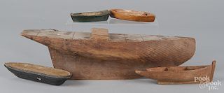 Five carved boat hulls and ingies, 19th/20th c.