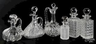 Three cut glass decanters