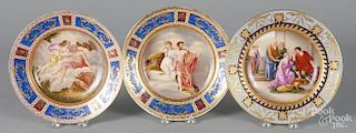 Three German painted porcelain shallow bowls