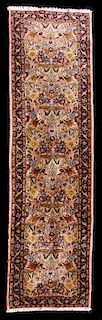 A 20TH CENTURY HAND MADE PERSIAN RUG RUNNER