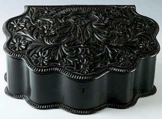 A FINE ANGLO-INDIAN HIGHLY CARVED EBONY DRESSER BOX