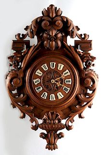 A 19TH C. HIGHLY CARVED BLACK FOREST WALL CLOCK