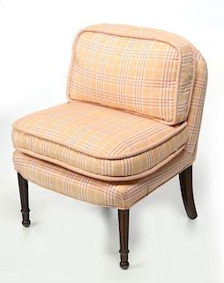 A 20TH CENTURY UPHOLSTERED SLIPPER CHAIR