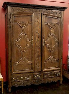 AN 18TH CENTURY FRENCH OAK ARMOIRE