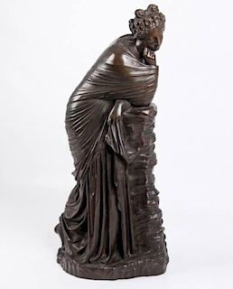FRENCH BRONZE SCULPTURE OF WOMAN RESTING ON WALL