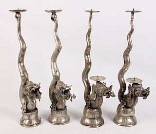 SET OF 4 SILVER AND BRASS CANDLESTICKS
