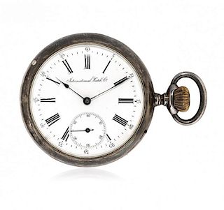 Two watches: one pocket watch signed International Watch & Co and a Longines travel watch, 1900 and 1920 circa