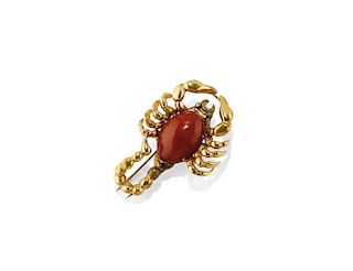 yellow gold and coral brooch