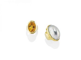TWO YELLOW GOLD AND GEM RINGS