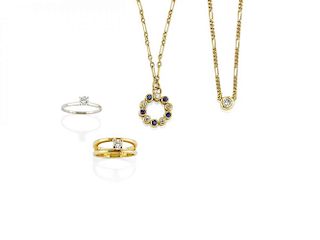 LOT OF TWO NECKLACES AND TWO RINGS IN GOLD AND DIAMONDS