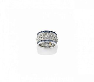diamond and blue sapphire eternity ring