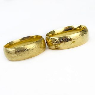 Pair of Antique Engraved 14 Karat Yellow Gold Wide Hinged Bangle Bracelets.
