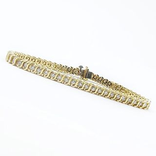 Vintage Approx. 2.25 Carat TW Round Brilliant Cut Diamond and 14 Karat Yellow Gold Bracelet. .