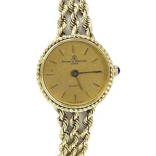 Lady's Vintage Baume & Mercier Genève 14 Karat Yellow Gold Bracelet Watch with Swiss Quartz Movement.