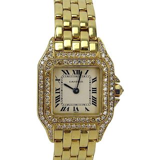 Lady's Cartier 18 Karat Yellow Gold and Diamond Panther Bracelet Watch with Swiss Quartz Movement, Box, Papers and Extra Brac
