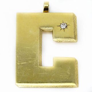 Vintage 14 Karat Yellow Gold Letter "C" Pendant with Round Brilliant Cut Diamond Accent.