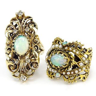 Two Vintage 14 Karat Yellow Gold and Opal Rings, One with Diamond accents, One with seed pearl accents.