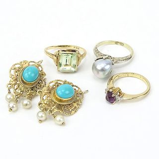 Collection of Four (4) Vintage Rings Including Amethyst, Diamond and 18 Karat Yellow Gold; Aquamarine and 10 Karat Yellow Gol