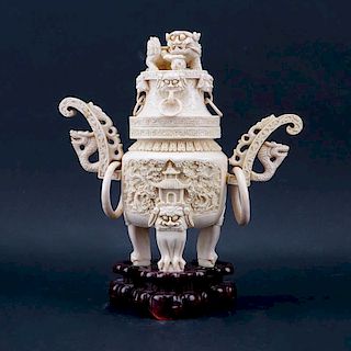 Vintage Faux Ivory Lidded Vessel. Features dragon ring handles, foo dog finial.