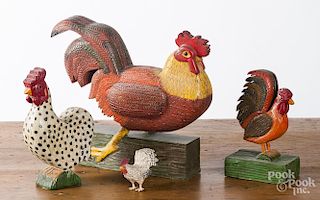 Three carved and painted roosters by Walter Squyre