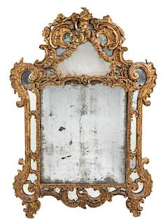 * A Regence Style Giltwood Mirror Height 42 x width 30 1/2 inches.