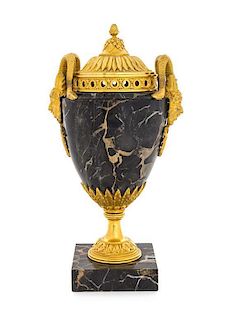 * A Louis XVI Style Gilt Bronze Mounted Marble Urn Height 10 5/8 inches.