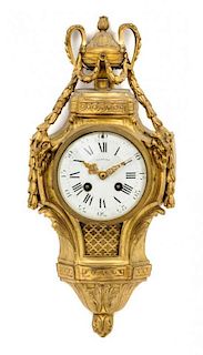 * A Louis XVI Style Gilt Bronze Cartel Clock Height 16 1/2 inches.