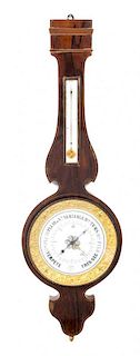 A French Rosewood Wheel Barometer Height 39 5/8 inches.