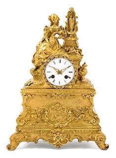 * A French Gilt Metal Figural Mantel Clock Height 14 1/2 inches.