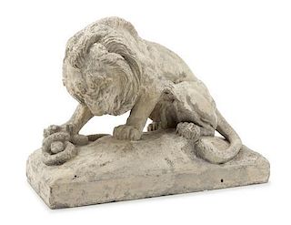 * A Cast Stone Figure of a Lion Height 11 3/4 x width 15 3/8 x depth 7 5/8 inches.