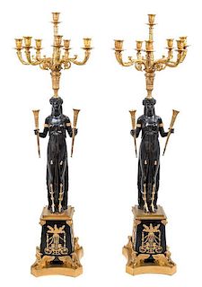 A Pair of Empire Style Gilt and Patinated Bronze Eight-Light Candelabra