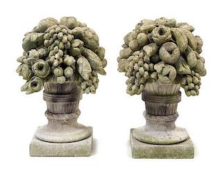 * A Pair of Cast Stone Garden Models of Fruit-Filled Urns Height 21 1/2 inches.