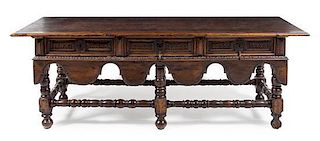 * An Italian Baroque Walnut Table Height 31 1/4 inches.