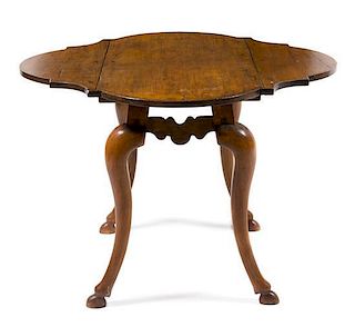 * An Italian Fruitwood Drop-Leaf Table Height 30 inches.