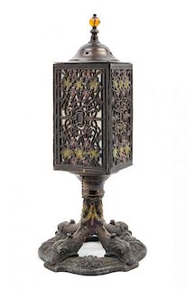A Patinated Metal Lantern Height 17 inches.