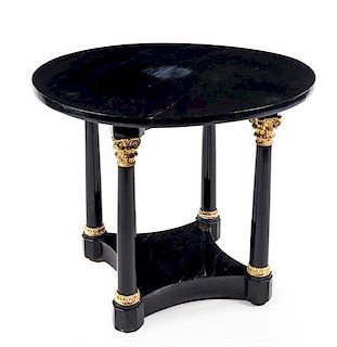 A Biedermeier Style Painted and Gilt Center Table Height 30 x diameter of top 37 inches.