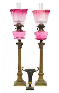 * A Pair of Bronze and Glass Lamps