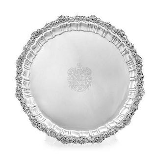 A George III Silver Salver, John Watson, Sheffield, 1820, the undulating rim worked to show rocaille, volutes and floral deco