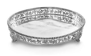 * A French Silver Wine Coaster, Alphonse Debain, Paris, First Quarter 20th Century, having a beaded rim and an openwork galle