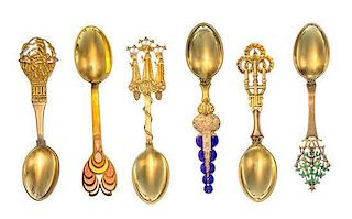* A Collection of Danish Silver-Gilt and Enamel Christmas Spoons, Anton Michelsen, Copenhagen, comprising examples from the y