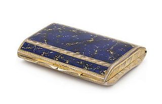 * A Continental Enameled Silver Snuff Box, , the lid worked with faux lapis enameled decoration, the underside chased with fl