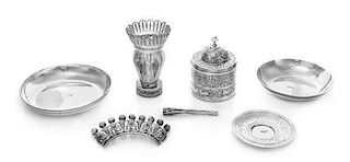 * A Collection of Seven Middle Eastern Silver Articles, Various Makers, comprising a filligree vase, hair ornament and cigare