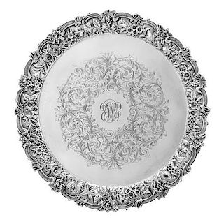 * An American Silver Salver, S. Kirk & Son, Baltimore, MD, the rim worked to show rocaille and C-scrolls enclosing the floral