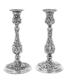 * A Pair of American Silver Candlesticks, S. Kirk & Son, Baltimore, MD, Repousse pattern, weighted.