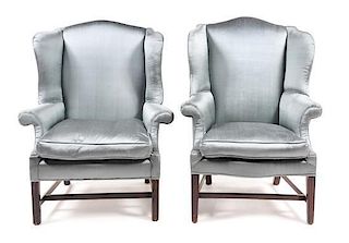 A Near Pair of Chippendale Mahogany Wing Chairs Height of first 47 inches.