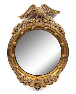 A Federal Style Giltwood Bullseye Mirror Height 33 x width 23 1/4 inches.