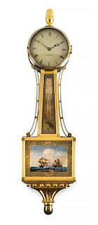 A Federal Style Mahogany and Parcel Gilt Banjo Clock Height 41 1/4 inches.