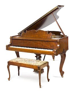 A Steinway & Sons Baby Grand Piano Length of case 67 inches.